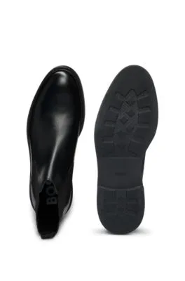 Botines Chelsea de piel con detalle de rayas de la marca