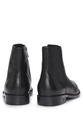 Botines de piel con logo grabado y cremallera lateral