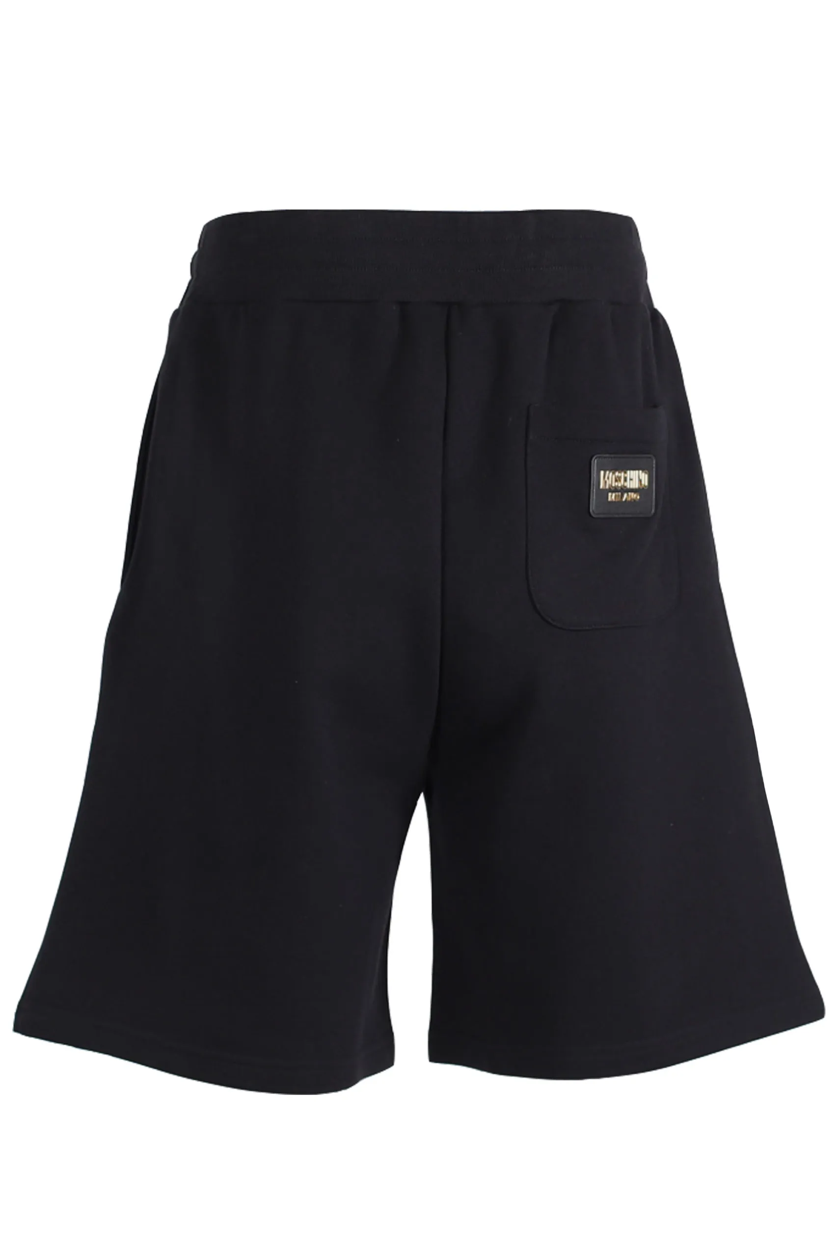 Pantalón negro corto logo en oro parte trasera
